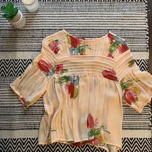 Light peach floral blouse